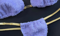 Handmade terry underwear. The panties are a thong. The fabric of the panties and the top can be gathered together to create small pleats